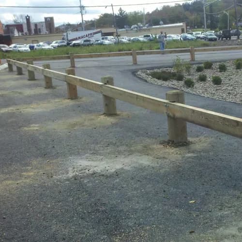 Guard rail roadway installation — Southington Rustic Fence Company project