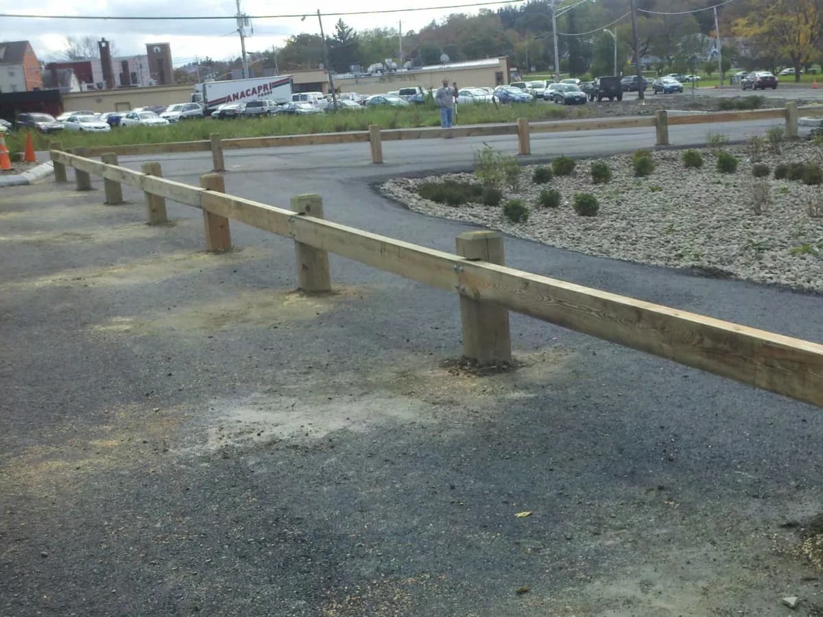 Guard rail roadway installation — Southington Rustic Fence Company project